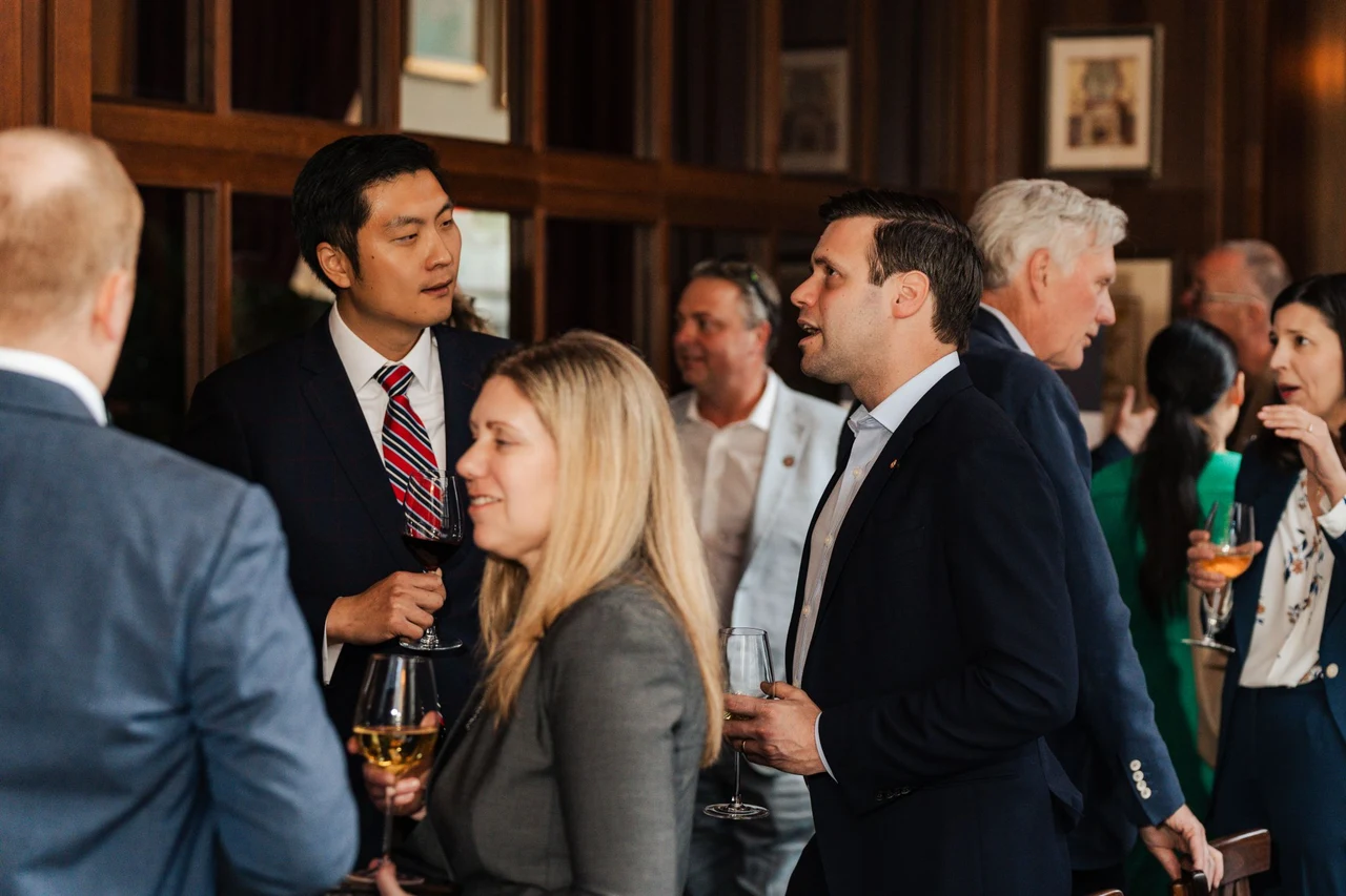 Attendees exchanging ideas at the PowerStack Washington, DC gathering